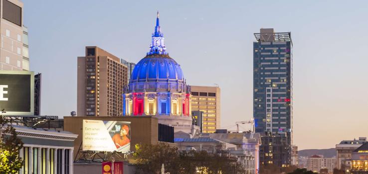 San Francisco City Hall lit up red, white and blue during election season